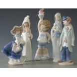 Five Lladro child figures including clown and Olympics figure, tallest 25cm