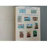 Six albums of Asian and Pacific Islands stamps