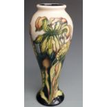 Moorcroft trial vase decorated with lilies, dated 2000, boxed, H27.5cm