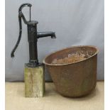 A cast iron garden pump, height 100cm, and a cast iron cauldron