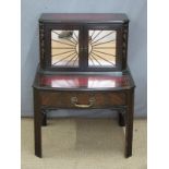 A 19th century low side cabinet with mirrored front, leather inset top and single drawer, W56 x