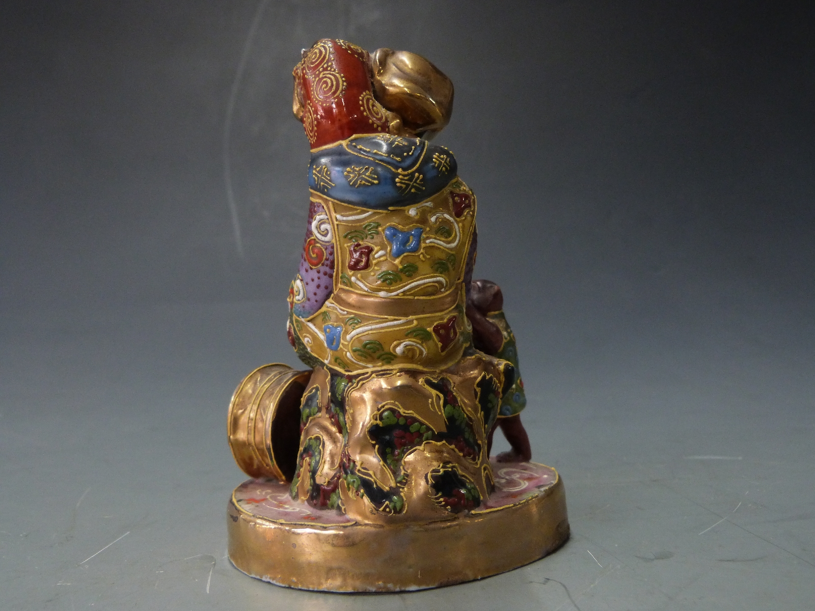 Early 20thC Japanese figure with monkeys, H13cm - Image 2 of 2