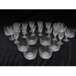 A suite of Edinburgh Crystal glasses comprising eight sherry glasses, six white wine glasses, two