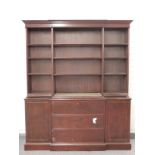 Mahogany astragal glazed breakfront bookcase with three graduated drawers and two cabinets under,