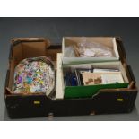 A large quantity of all world stamps, loose and in packets together with a large tin of Holland