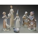 Five Lladro figures including Collector's Club clown with puppies, tallest 34cm