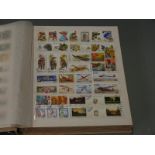 Stockbook of mint and used stamps from Russia, including mini sheets etc