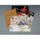 A collection of mainly Manchester United related memorabilia comprising Bobby Charlton signed The