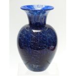 Dartington studio glass vase with blue crackle decoration, 23cm tall.