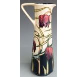 Moorcroft signed Anji Davenport ewer or jug decorated with flowers and dated 2001, boxed, H23.5cm
