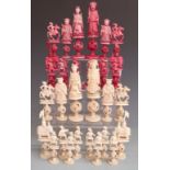 19thC Chinese ivory puzzleball chess set in mahogany box, height of king 17cm, pawns 8.5cm