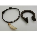 African bronze money and an African braided elephant hair bracelet