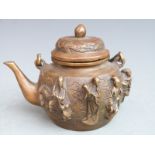 Chinese bronze/ brass tea pot decorated with various figures and four character mark to base, 10cm