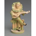 Wade style cellulose jester musician, indistinctly signed verso, H15cm