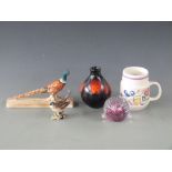 Beswick pheasant model 1774, Poole pottery vase and mug and Caithness paperweight