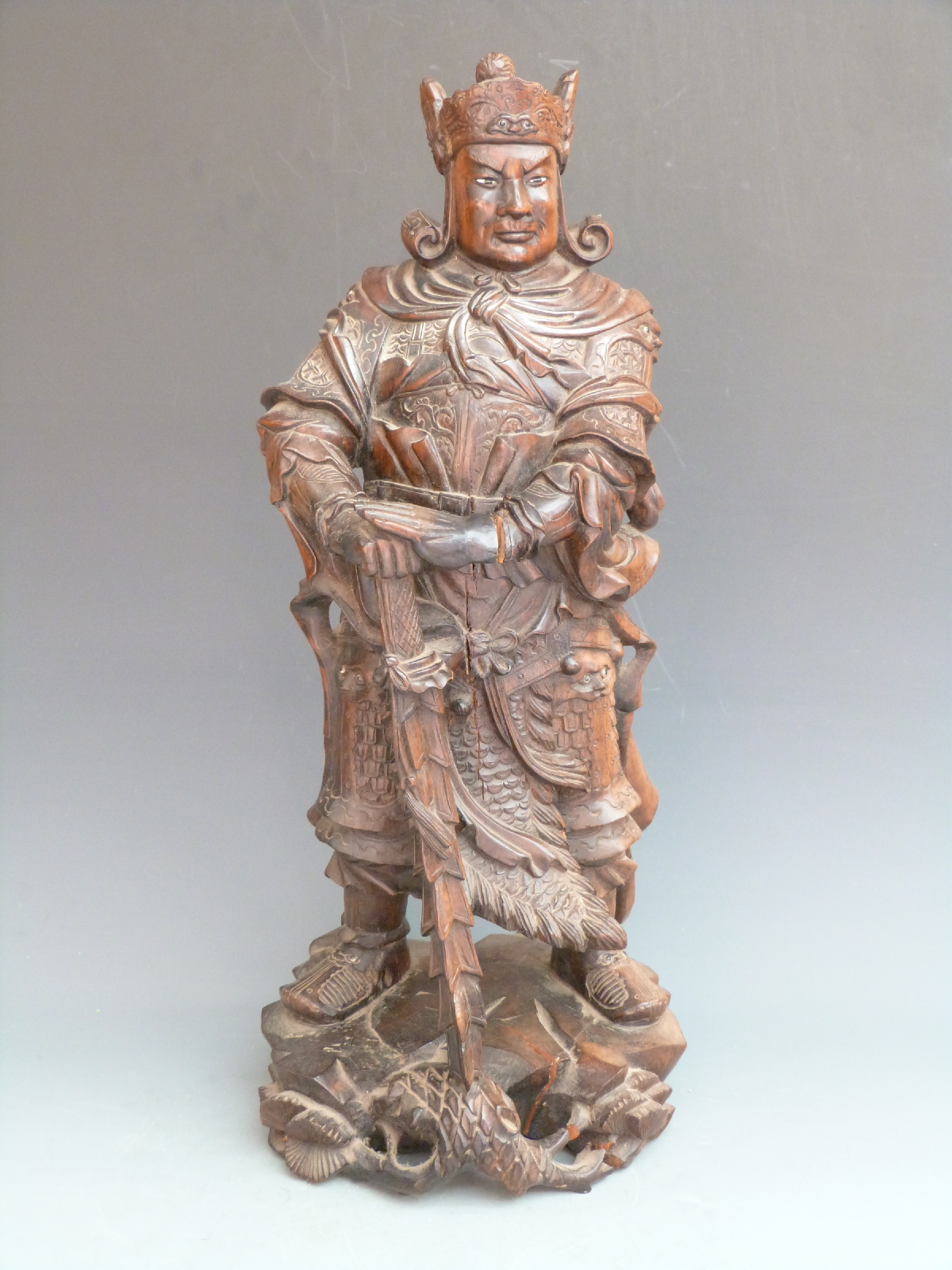 A carved hardwood Japanese Samurai warrior, 55cm tall