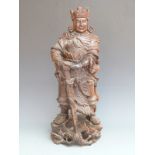 A carved hardwood Japanese Samurai warrior, 55cm tall