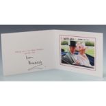 HRH Prince Charles and Camilla photographic Christmas card depicting the couple in a carriage,