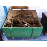 Quantity of woodworking tools including chisels, plane, braces, square etc in a vintage chest