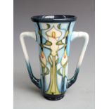 Moorcroft twin handled loving cup decorated with Arum lilies dated 2001, boxed, H15cm