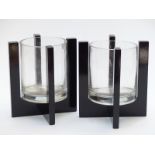 Pair of Art Deco style glass vases with black frames, 20.5cm tall