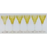 Six John Walsh Walsh wine glasses with uranium style yellow glass bowls cut and engraved with