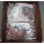 A large quantity of foreign, Commonwealth and GB stamps sorted into packets, all periods