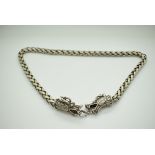 Chinese white metal necklace with dragon head decoration, length 68cm