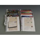 Album of mint Isle of Man stamps and mini sheets, together with collectable booklets relating to the