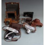 Vintage cameras to include plate camera with brass fittings, Balda folding camera, Arette C and
