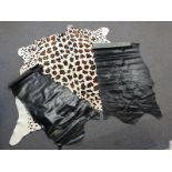 Three hides, one leopard approximately 180cm, two black leather finish approximately 190cm & 175cm