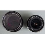 Two Nikon SLR camera lenses comprising Nikkor 135mm 1:3.5 and 28mm 1:3.5