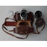 Praktica IV SLR camera with Carl Zeiss Biator 2/58 and Saiga f3.5 135mm lenses