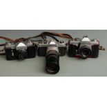 Pentax K1000 SLR camera with Hoya 200mm 1:3.5 lens, Praktica LTL 3, Zenit B etc