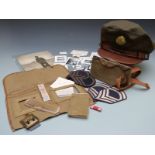 WWII United States small collection of ephemera for Chas Oscar Graf including cap, rank badges