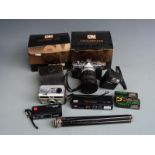 Olympus OM-1 SLR camera with Makinon 1:3.5-4.5 f=28-80mm zoom lens, various accessories and boxes