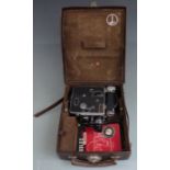 Paillard Bolex H8 cine cameras with three lens carousel, in leather case with accessories and