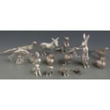 Fifteen silver plated animals including a salt and pepper in the form of partridges, otter, mallard,