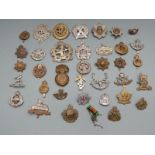 British military and other cap badges including hallmarked silver ARP badge