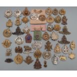 British Forces cap badges including Gloucestershire Regiment, Royal Artillery, The Queen's and Royal