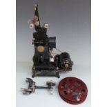 Pathé Baby 9.5mm projector with two reels of film believed to show the 8th Army during Africa