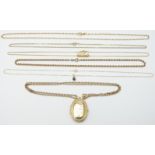 A 9ct gold locket and chain, 9ct gold rope twist necklace, two other 9ct gold necklaces, (20g) and