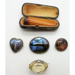 Two silver brooches set with butterfly wing, a citrine brooch and amber cheroot holder