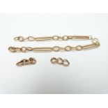 A 9ct rose gold bracelet made up of elongated links, 8.8g