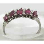 A 9ct white gold ring set with marquise cut rubies and diamonds, 1.9g, size K