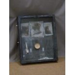 Glazed wall hanging display of lead items including cutlery, lead framed monochrome pictures etc, 82