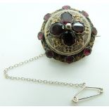 Victorian silver gilt brooch set with foiled garnets