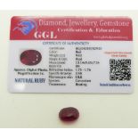 A loose oval cut ruby measuring approximately 9.63ct