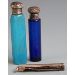 An aqua coloured agate scent bottle with embossed white metal top, length 8cm, blue glass scent
