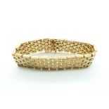 A 9ct gold bracelet made up of rectangular sections, 39.8g